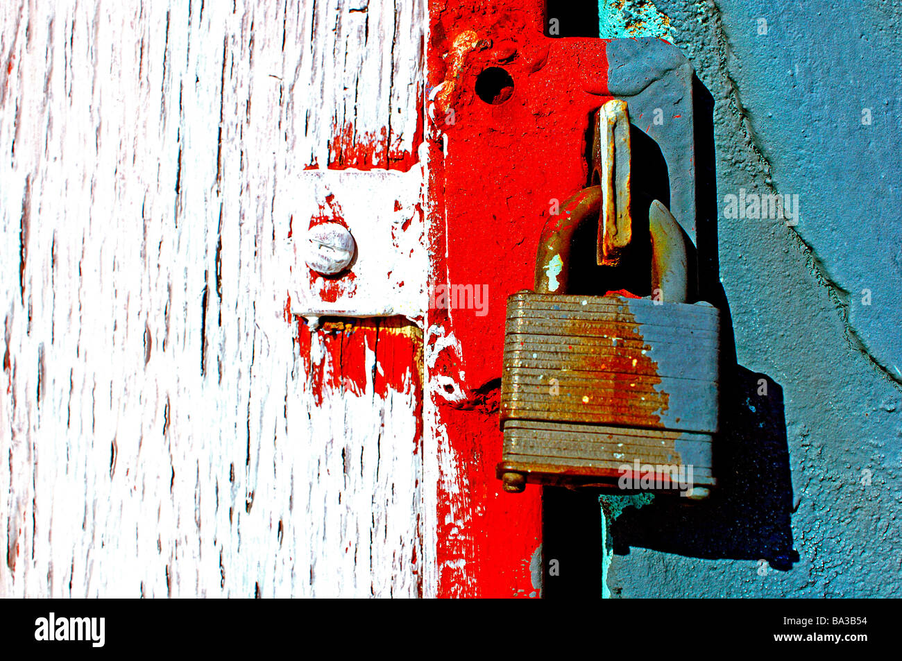 Brightly painted building door jam with security lock Stock Photo Alamy