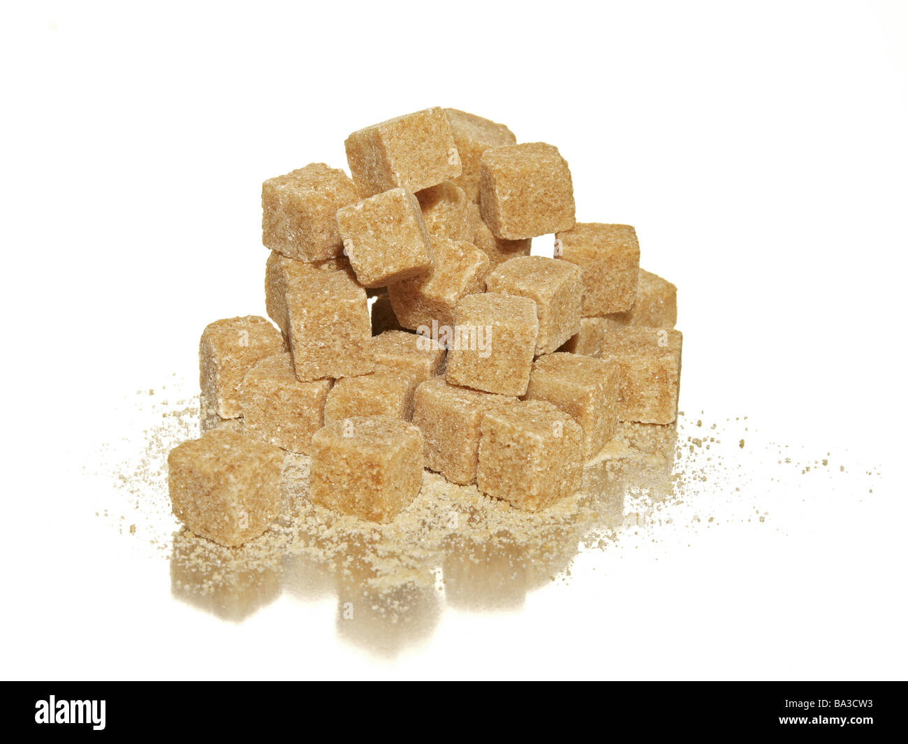 Die-sugar brown food sweeteners sucrose tube-sugar sugar sweetly dice  die-form sugar-dice multiplicity piled up one on the Stock Photo - Alamy