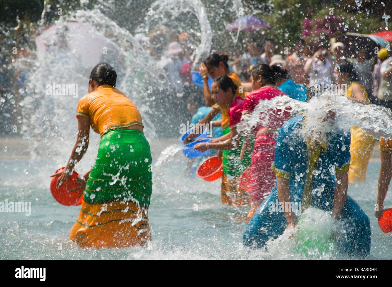 the biggest water fight party in the world as the Dai minority celebrates the SE Asian new year in Yunnan China Stock Photo