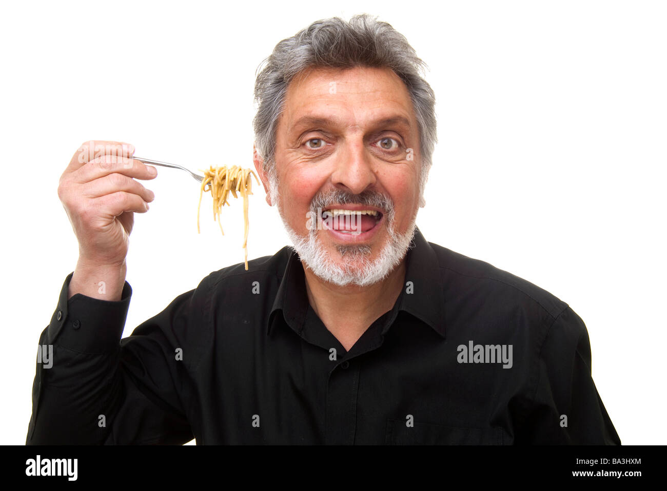 man with a fork full of spagetti Stock Photo