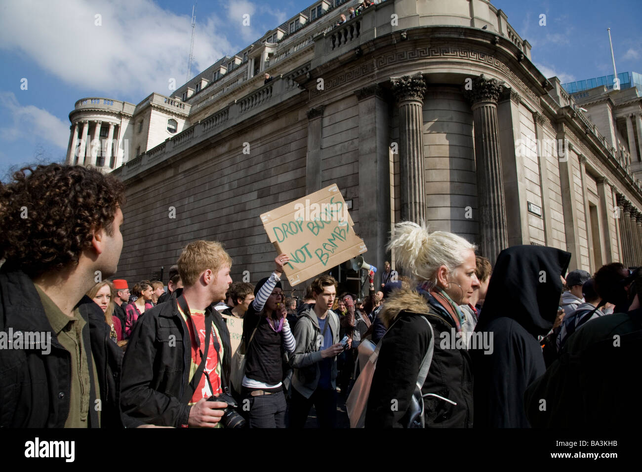 People march carrying placards during the G20 protest at Bank of England Stock Photo