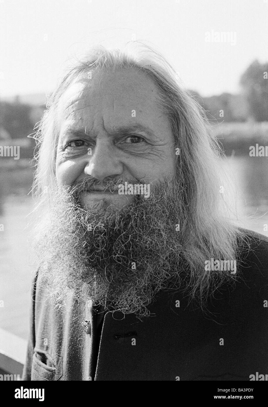 Seventies, black and white photo, people, older man, portrait, long-haired, full beard, moustache, aged 65 to 75 years Stock Photo