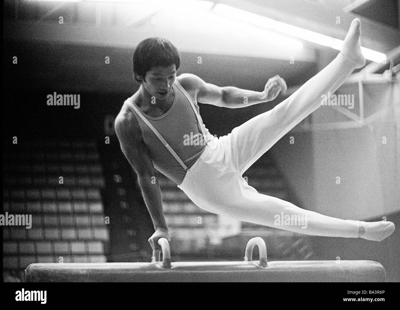 Seventies, black and white photo, sports, artistic gymnastics, competition 1974, Oberhausen versus Bayer Leverkusen, pommel horse, gymnast Hirata, man, aged 20 to 25 years, D-Oberhausen, Ruhr area, North Rhine-Westphalia Stock Photo