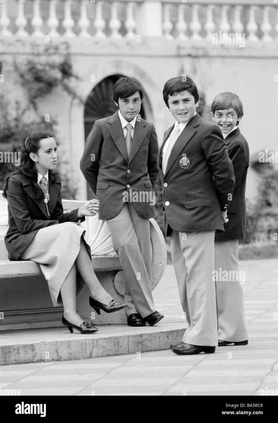 Eighties, black and white photo, Easter, Passion Week, Palm Sunday 1981, young girl and three boys in Sunday best under discussion, girl, aged 16 to 18 years, boys, aged 12 to 16 years, Spain, Canary Islands, Canaries, Tenerife, La Orotava Stock Photo