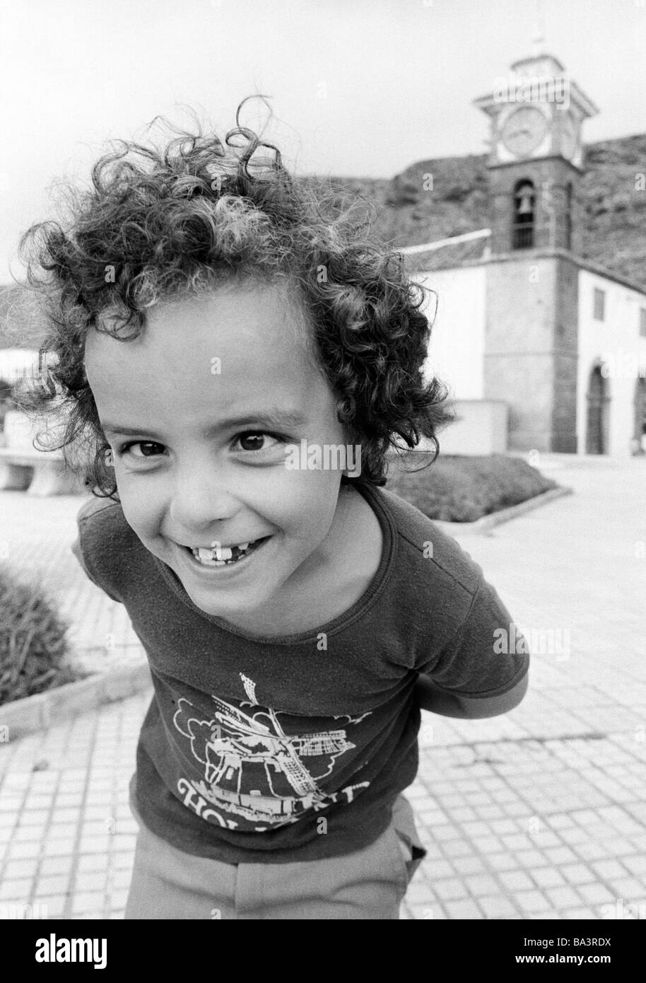 Eighties, black and white photo, people, children, little boy laughs in the camera, portrait, fishey lens, aged 6 to 10 years, Spain, Canary Islands, Canaries, Tenerife, San Juan Stock Photo