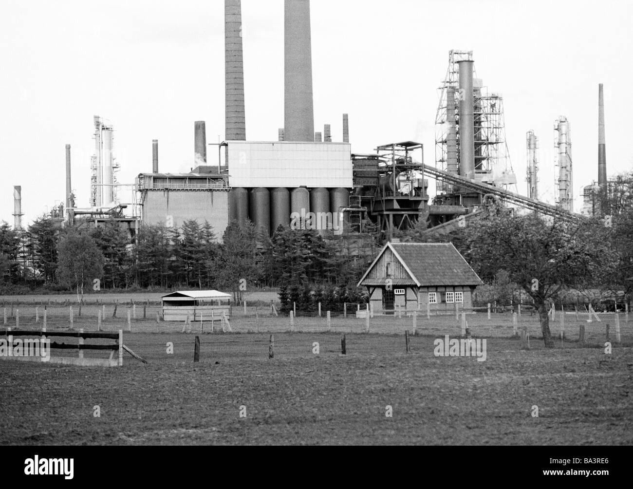 Eighties, black and white photo, economy, chemistry, chemical factory, agrictulture, pasture, farmhouse, Emsland, Lower Saxony Stock Photo