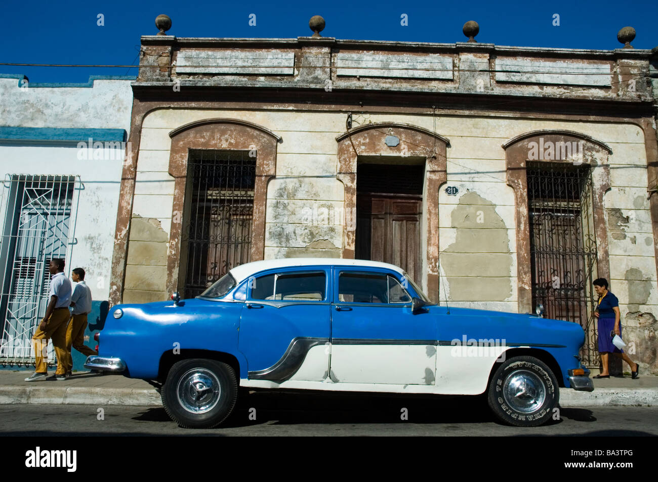 CUBA Camaguey Street scene with an American car from the 1950 s March 2009 Stock Photo