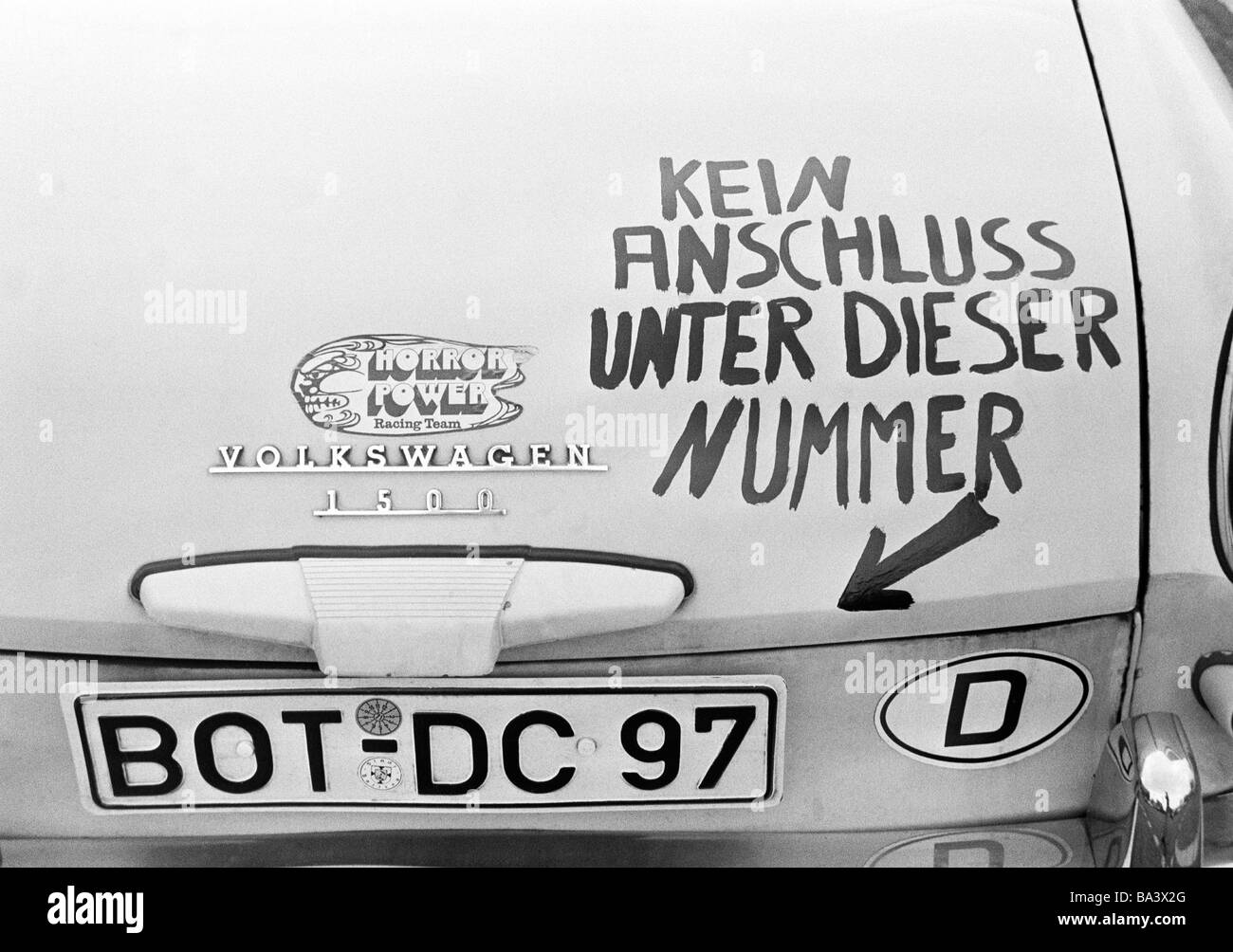 Seventies, black and white photo, humour, product photography, car painted with witty saying, hint to the vehicle registration mark, 'No such number' Stock Photo