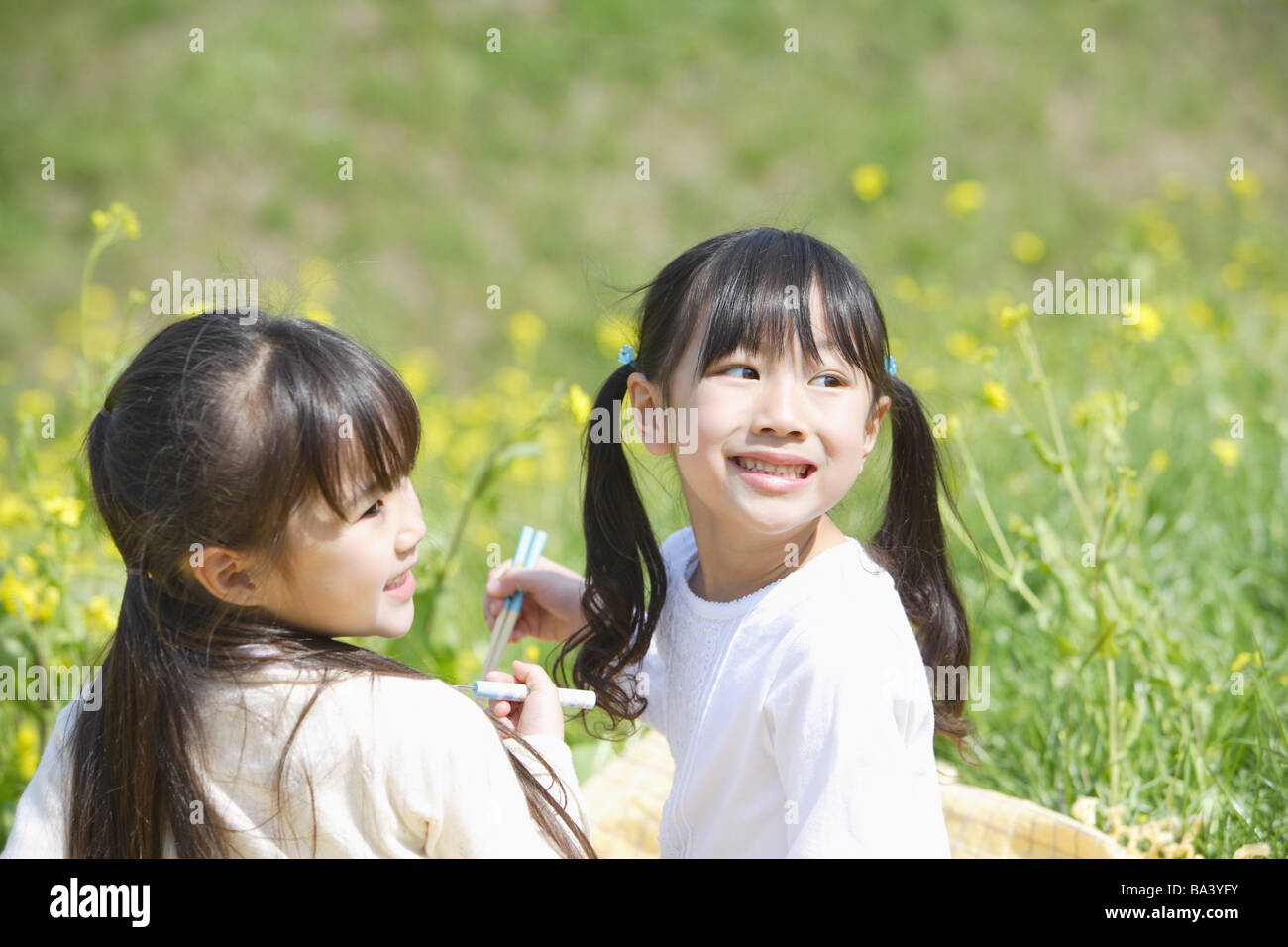 Japanese girls eating lunch together Stock Photo