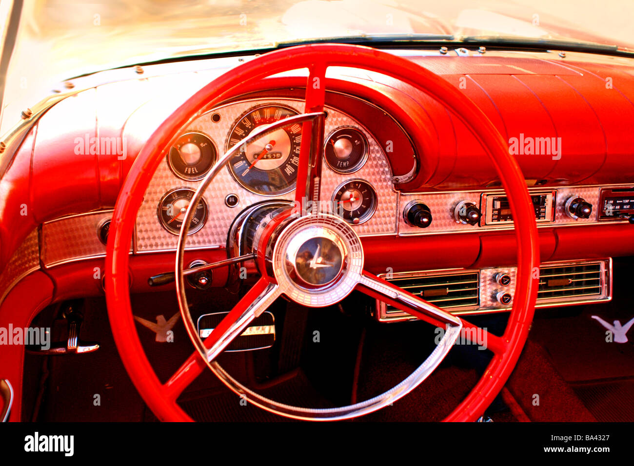Interior shot of Gleaming red1957 Ford thunderbird convertible, parked on the street in the lakewood area of Dallas. Stock Photo