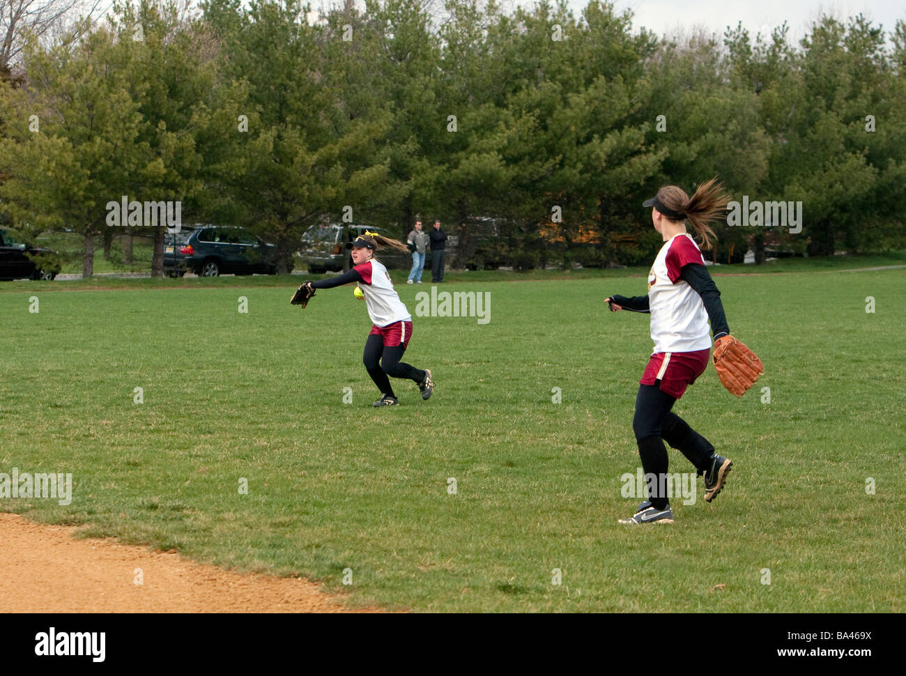 A girls highschool softball game Stock Photo Alamy