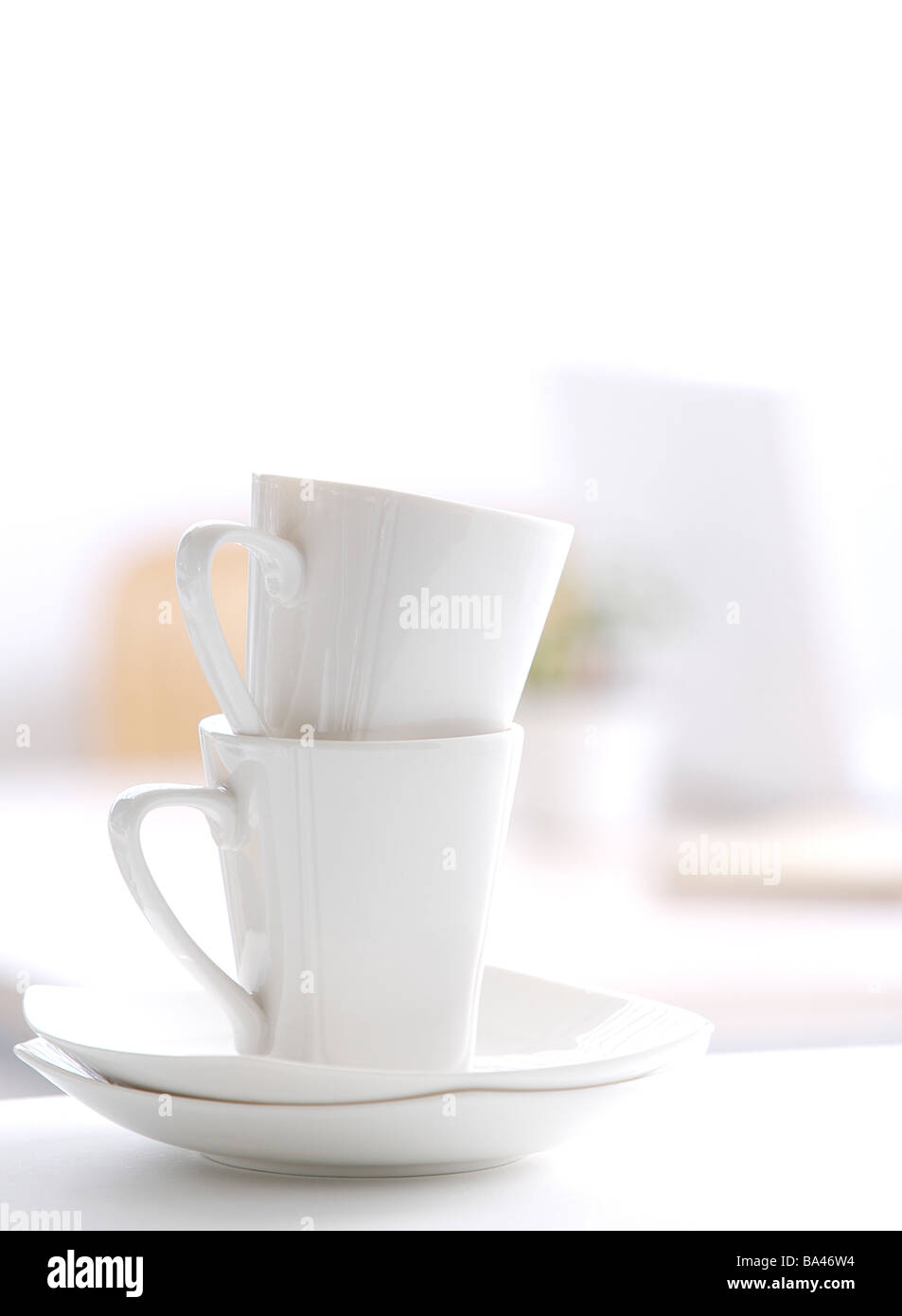 Tea sets in kitchen table Stock Photo - Alamy