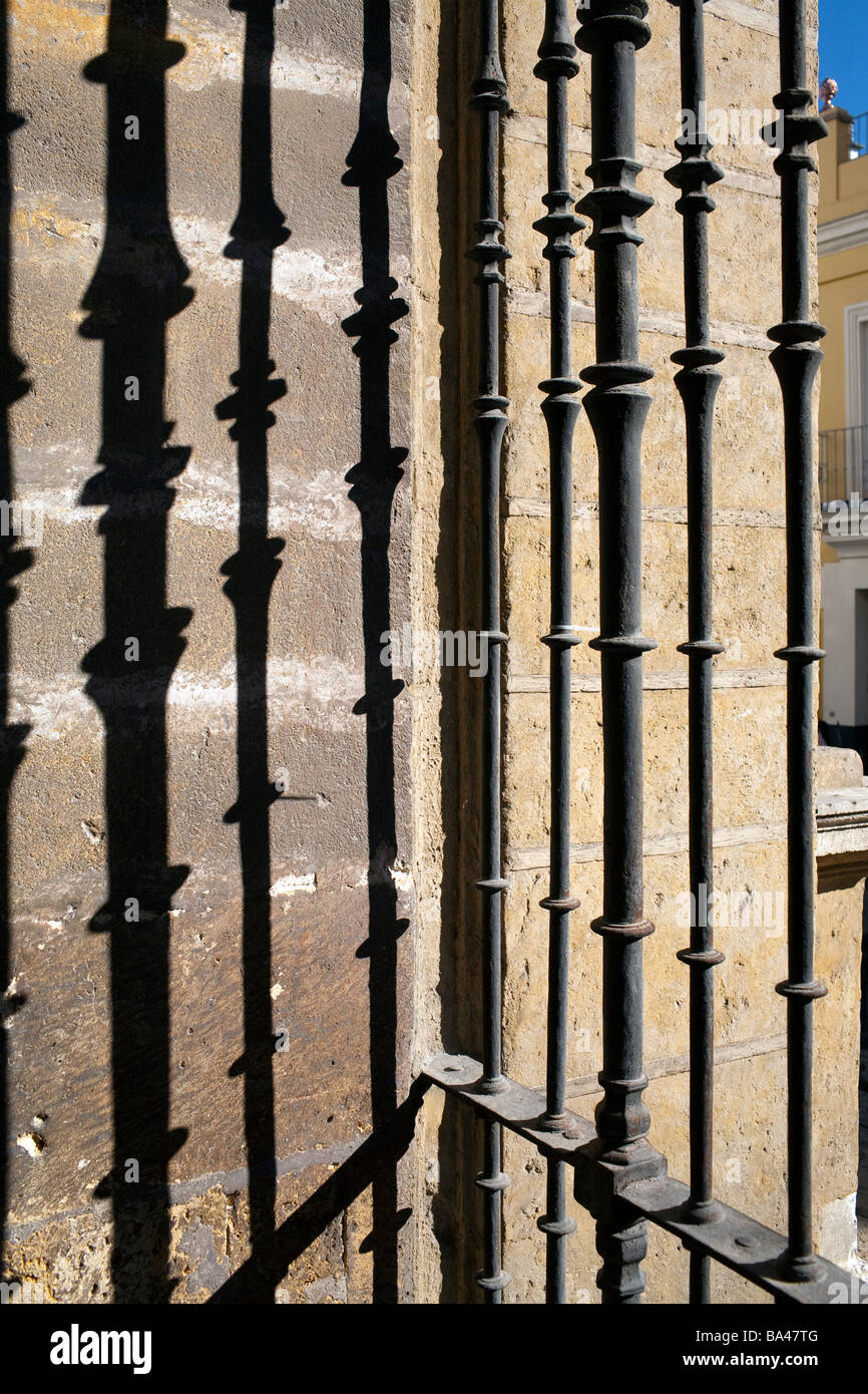 Bars of an iron fence San Luis church 18th century town of Seville autonomous community of Andalusia southern Spain Stock Photo