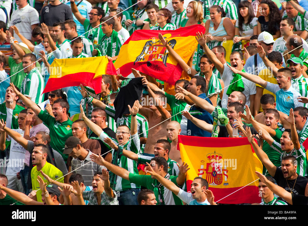 real-betis-fans-showing-franco-s-spanish-flag-with-the-eagle-and-doing-BA49FA.jpg