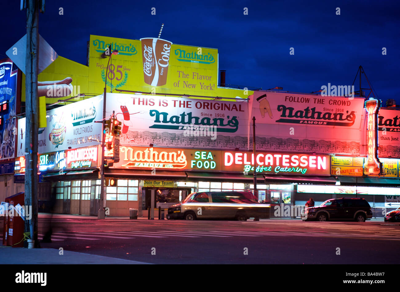 Nighttime view of Nathans Delicatessen Restaurant in Coney Island, New York (For Editorial Use Only) Stock Photo