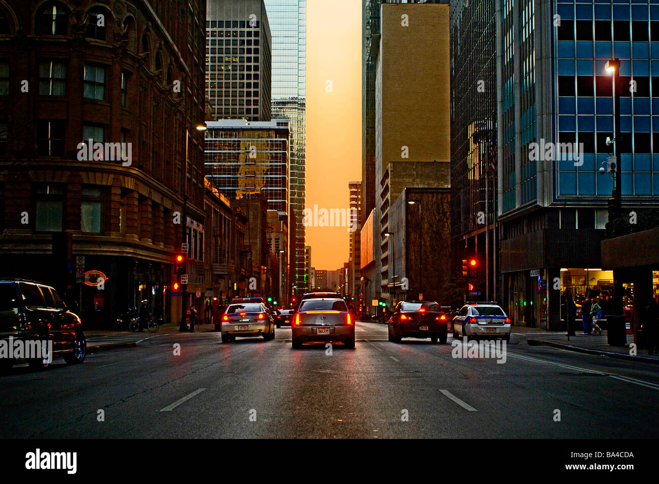 Street scene at dusk on a busy downtown Dallas streetStreet scene at