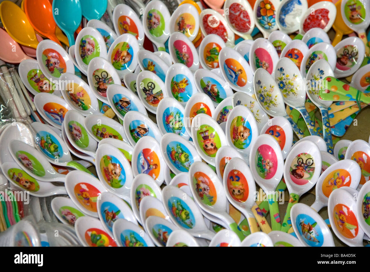 Soup spoons being sold at a market in the Cholon district of Ho Chi Minh City Vietnam Stock Photo