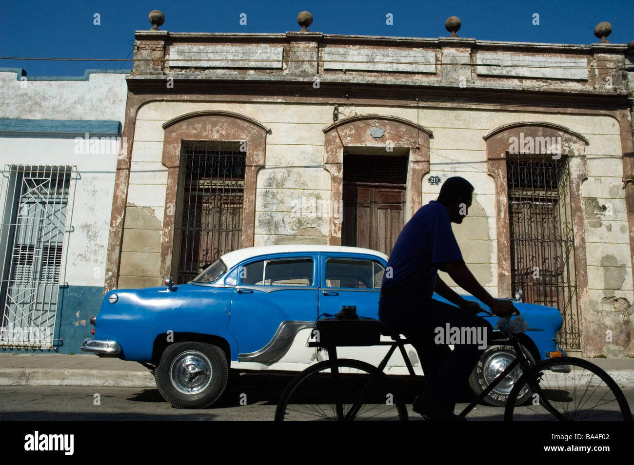 CUBA Camaguey Street scene with an American car from the 1950 s March 2009 Stock Photo