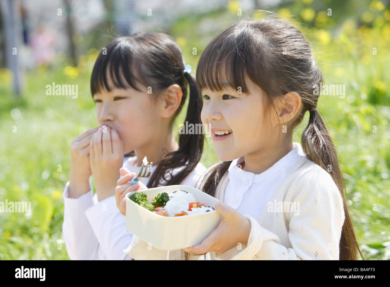 Japanese girls eating lunch together Stock Photo