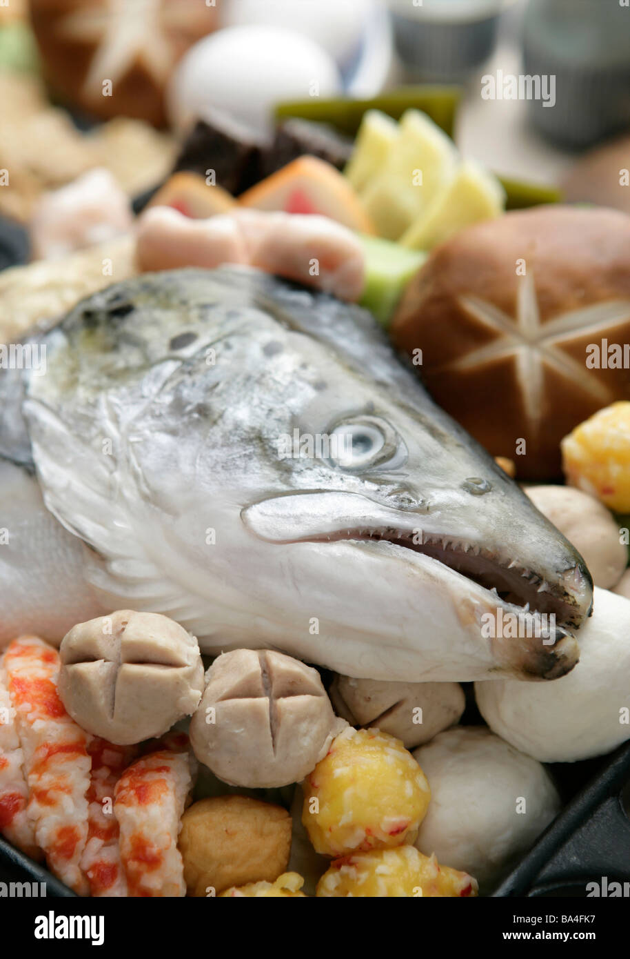 Salmon s head on raw food Stock Photo - Alamy
