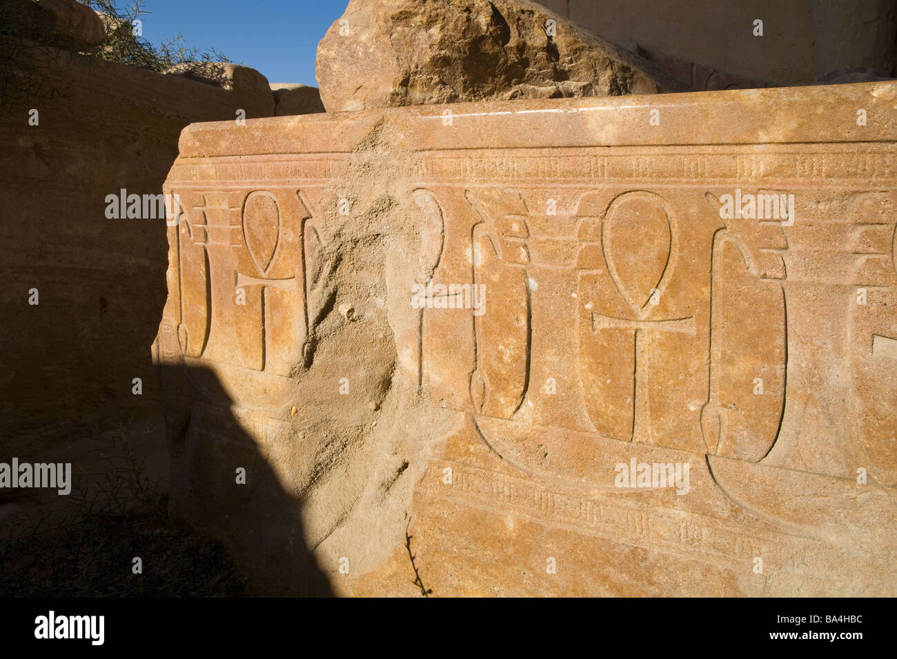 Close up detail of Ankh, Was Sceptre and Djed Pillar hieroglyphs carved on block at Karnak Temple, Luxor Egypt Stock Photo
