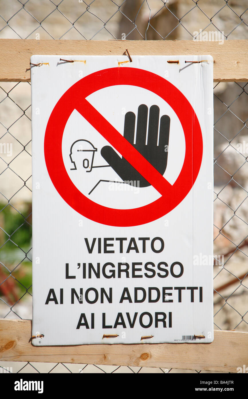 Warning sign in the construction zone, Cagliari, Sardinia, Italy Stock Photo