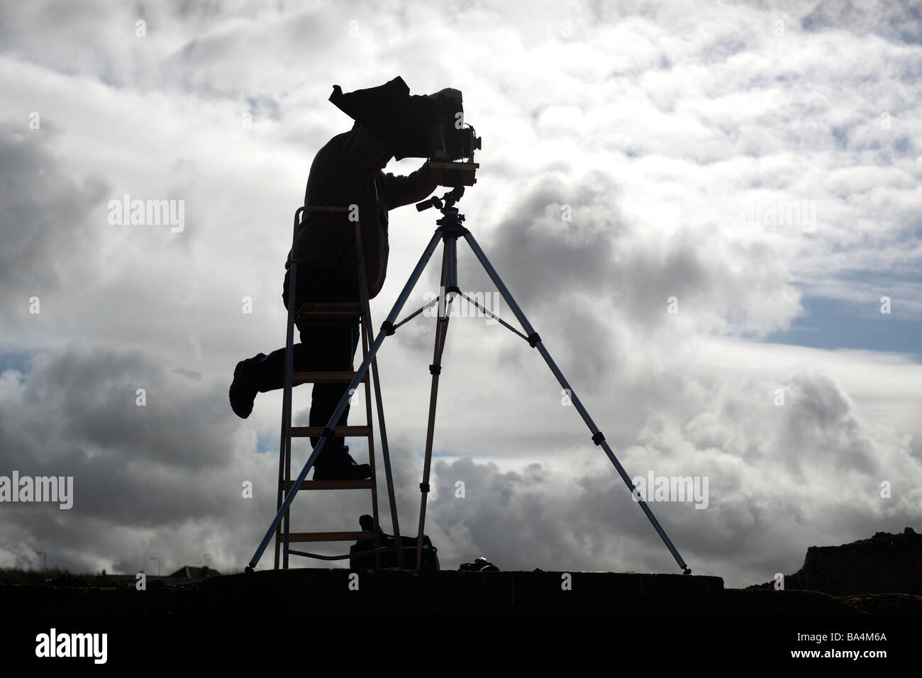 A photographer using a large format camera on a tripod Stock Photo Alamy