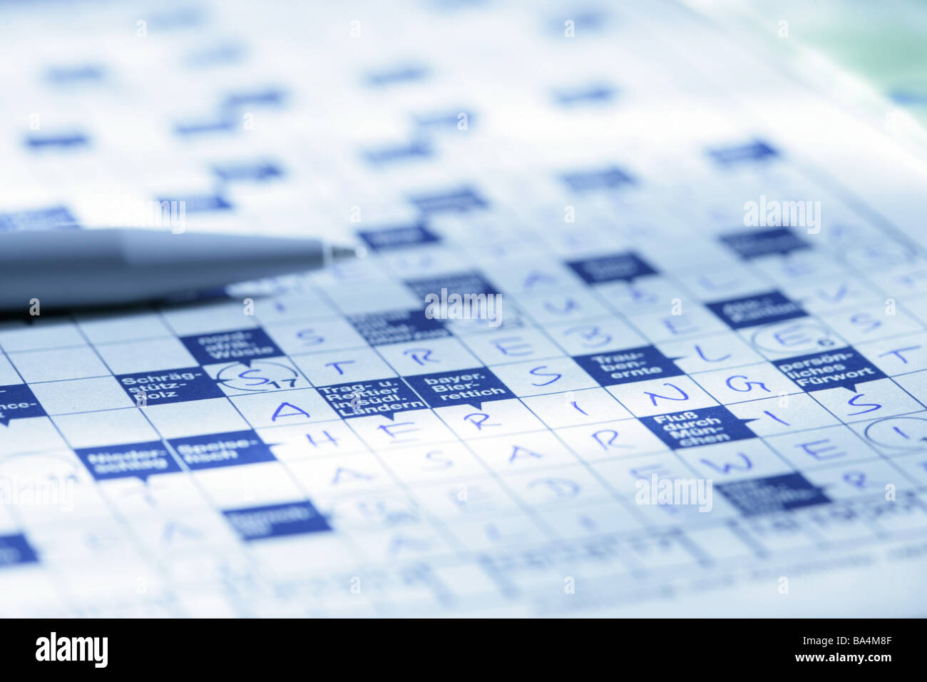 Crossword puzzles ballpoint pens closeup puzzles pen writingpen