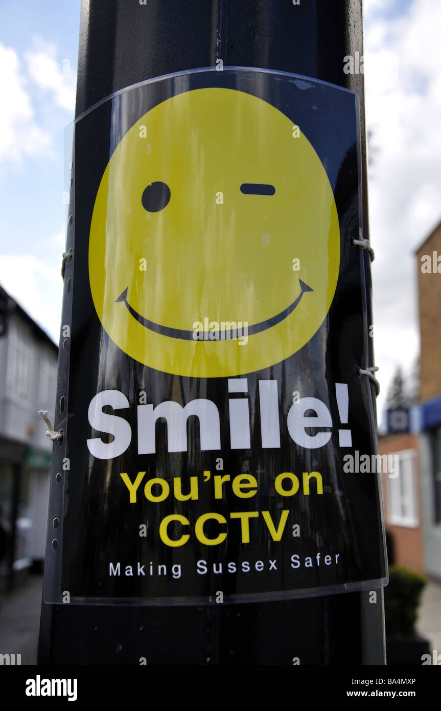 'Smile you're on CCTV' notice, High Street, Crawley, West Sussex, England, United Kingdom Stock Photo