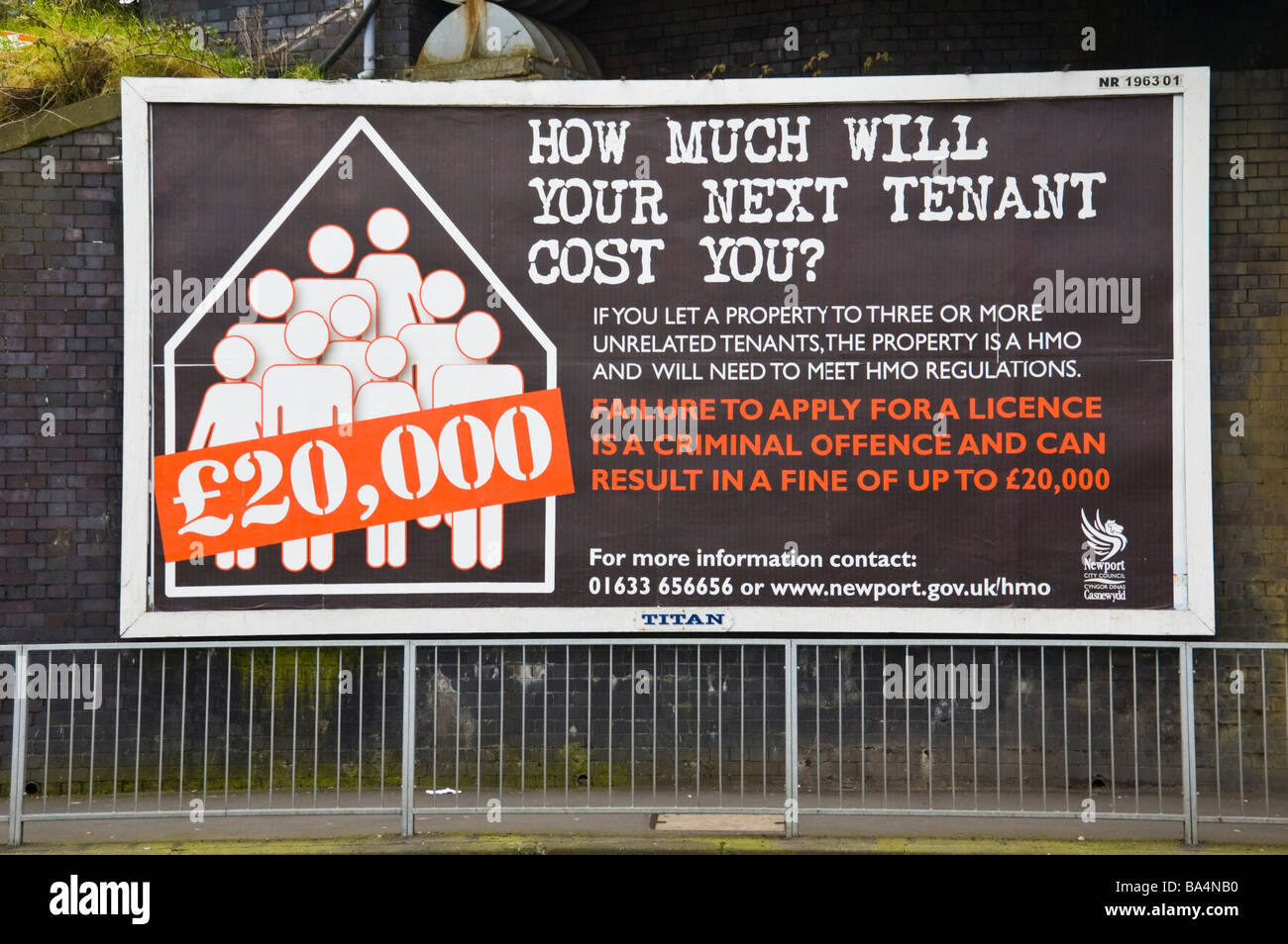 Titan advertising billboard for landlords with houses of multiple occupation on hoarding in Newport South Wales UK Stock Photo