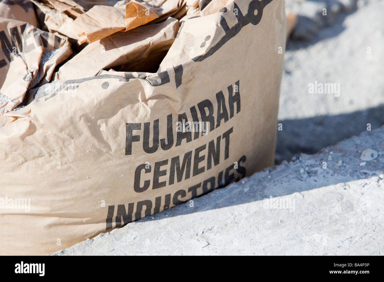 a bag of cement on a Dubai construction site Stock Photo Alamy
