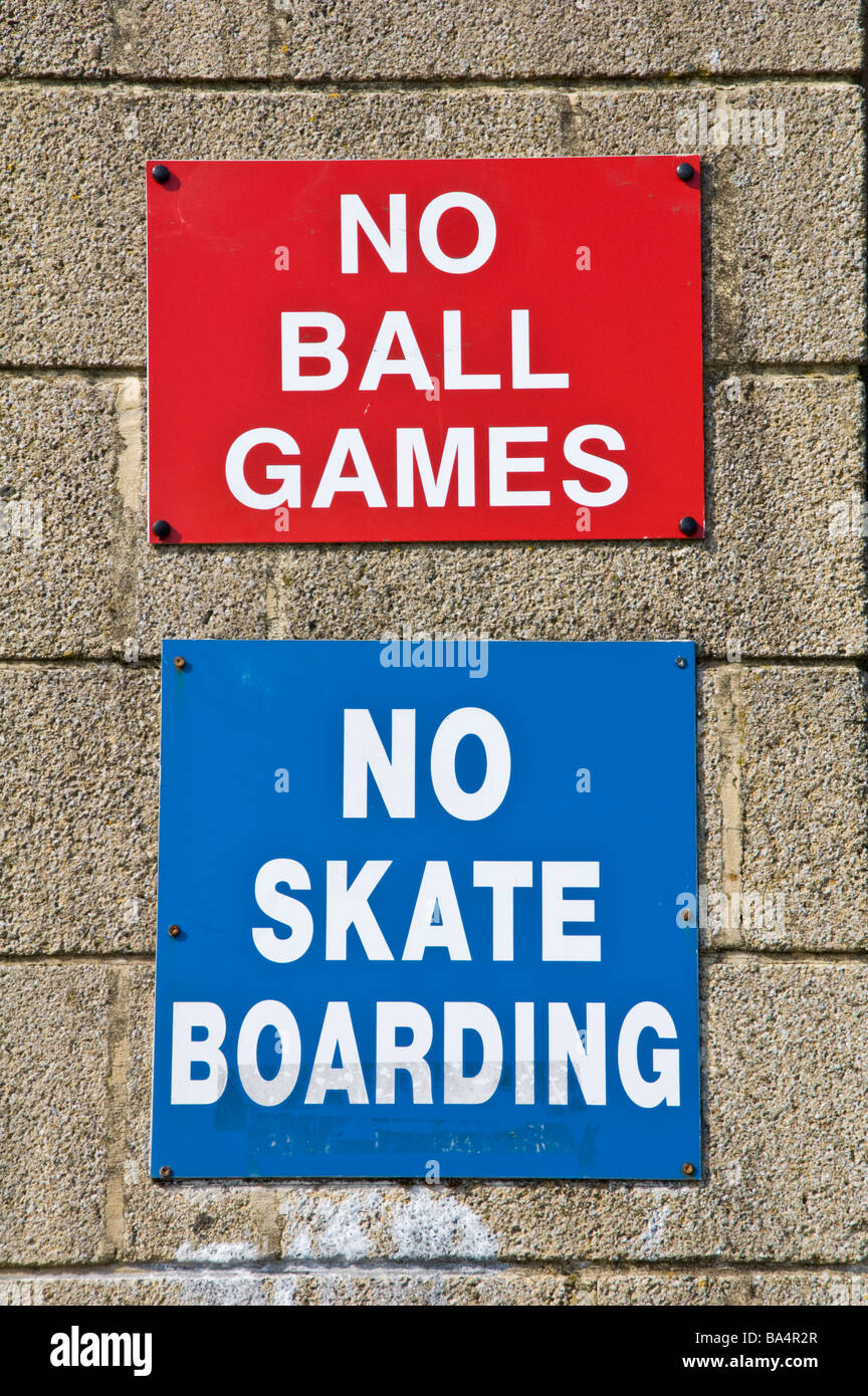 NO BALL GAMES NO SKATE BOARDING signs in town centre car park at Ebbw Vale Blaenau Gwent in the South Wales Valleys UK Stock Photo