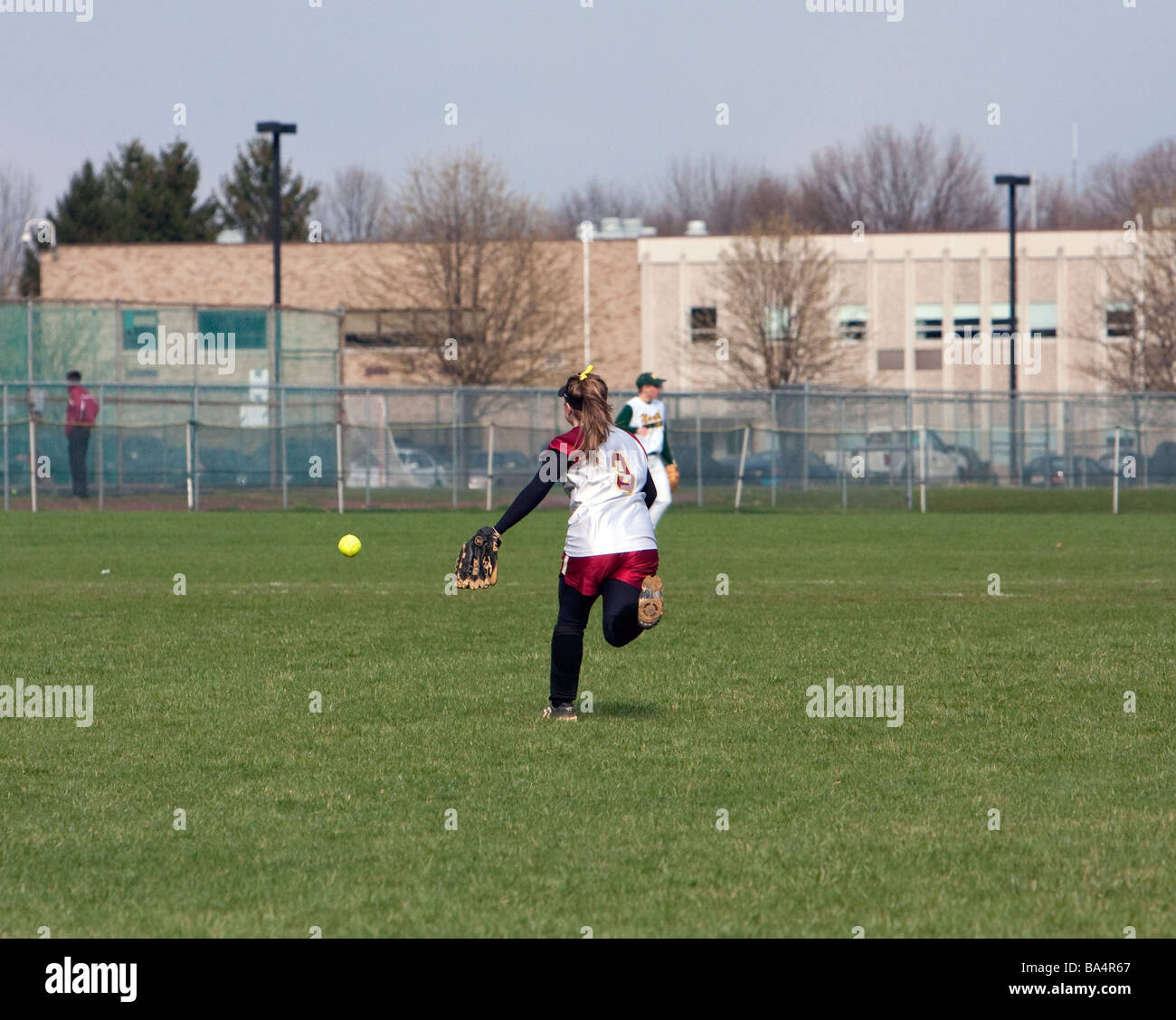 A girls highschool softball game Stock Photo Alamy