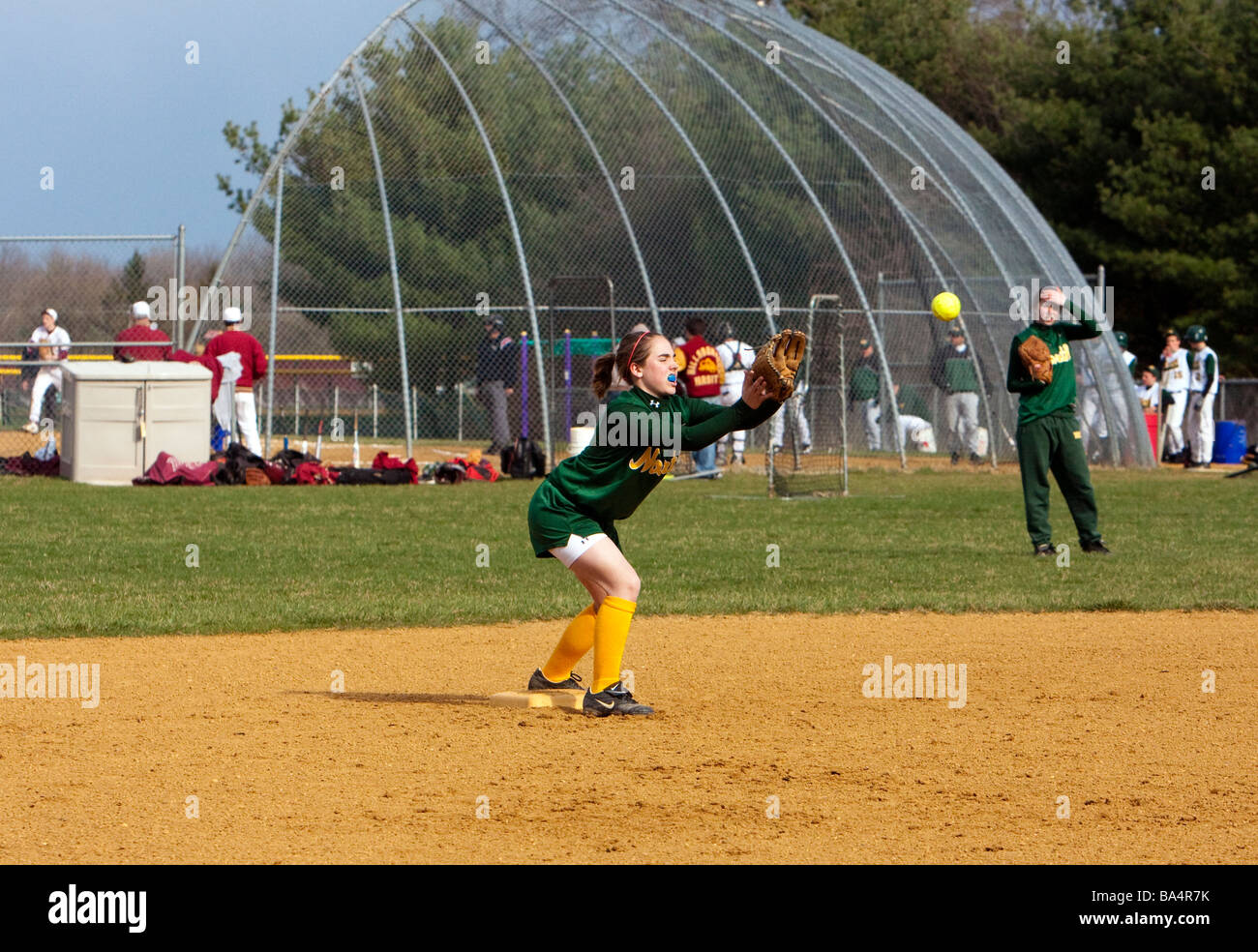 A girls highschool softball game Stock Photo Alamy