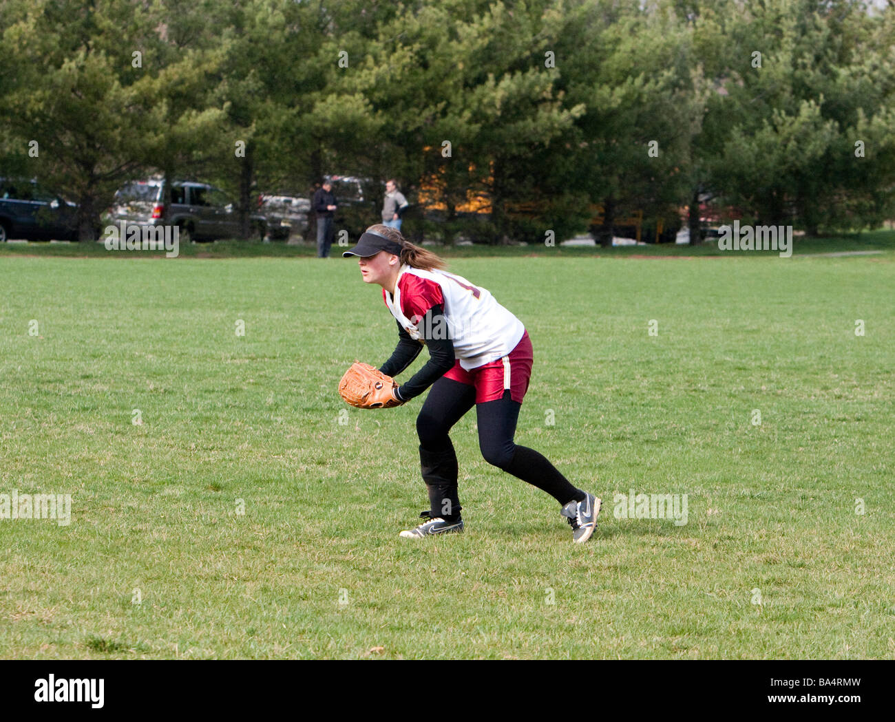 A girls highschool softball game Stock Photo Alamy