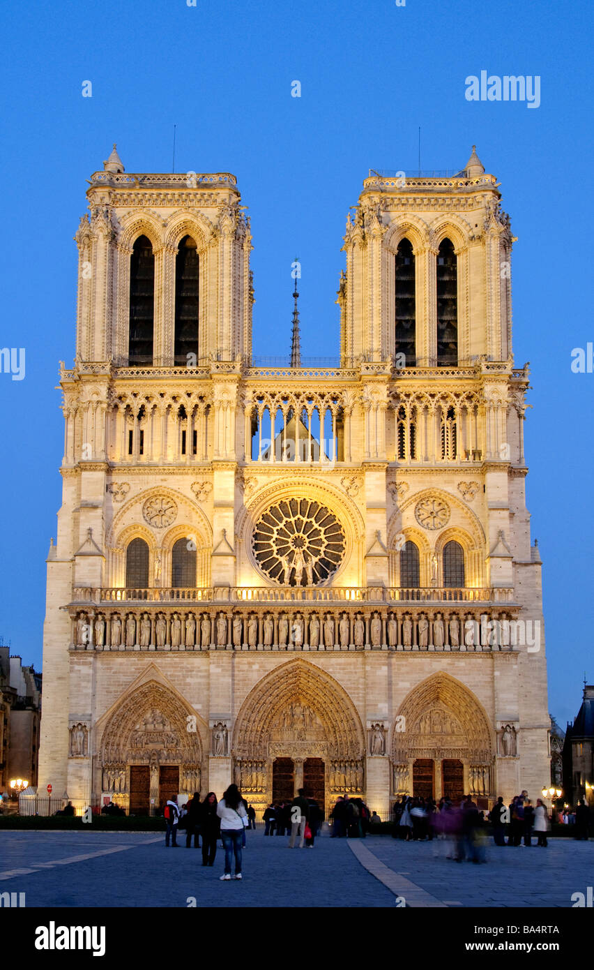 PARIS, France - Notre Dame Cathedral, front view, in the evening with a ...