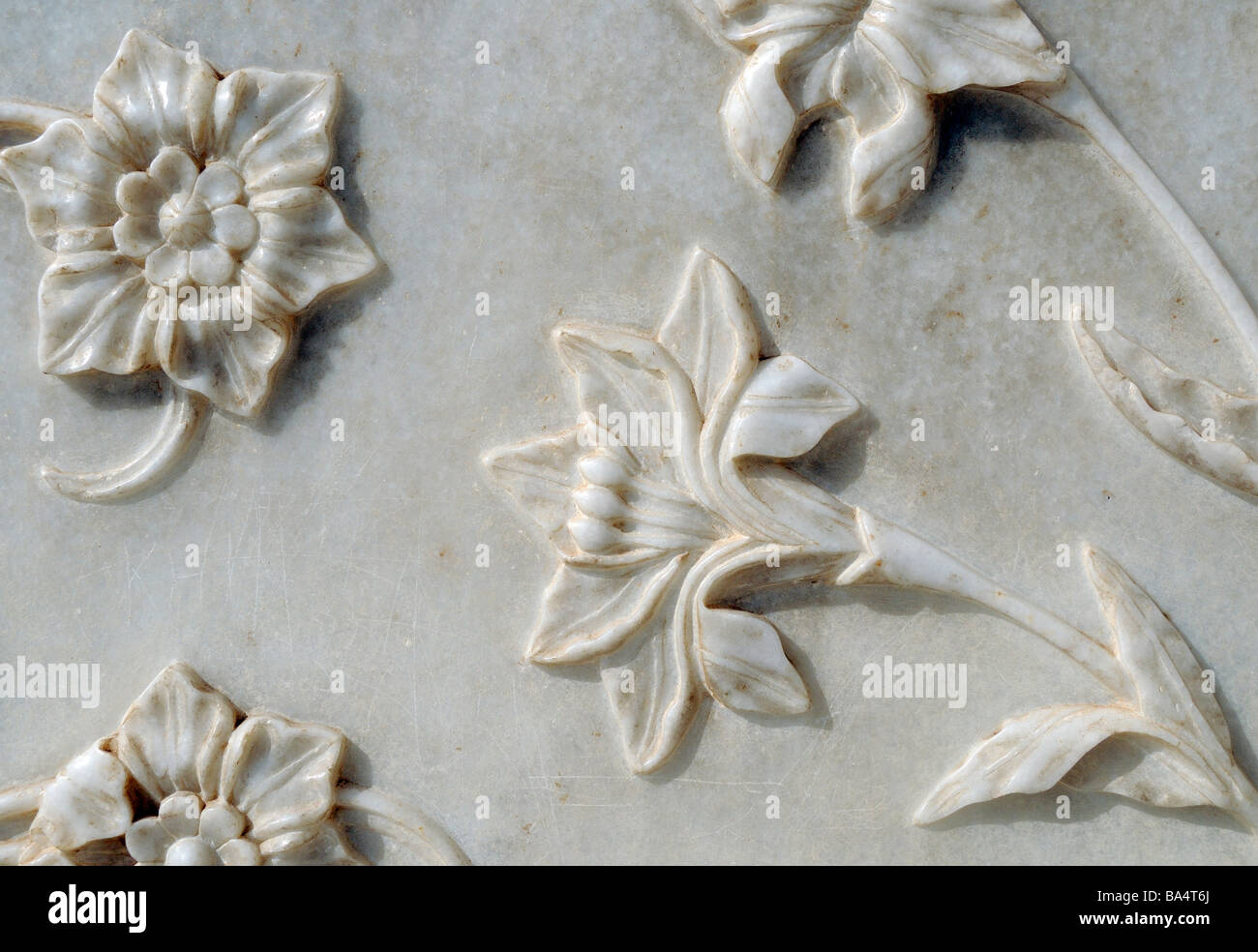 Marble panel delicately carved with flowers at the Taj Mahal. Stock Photo