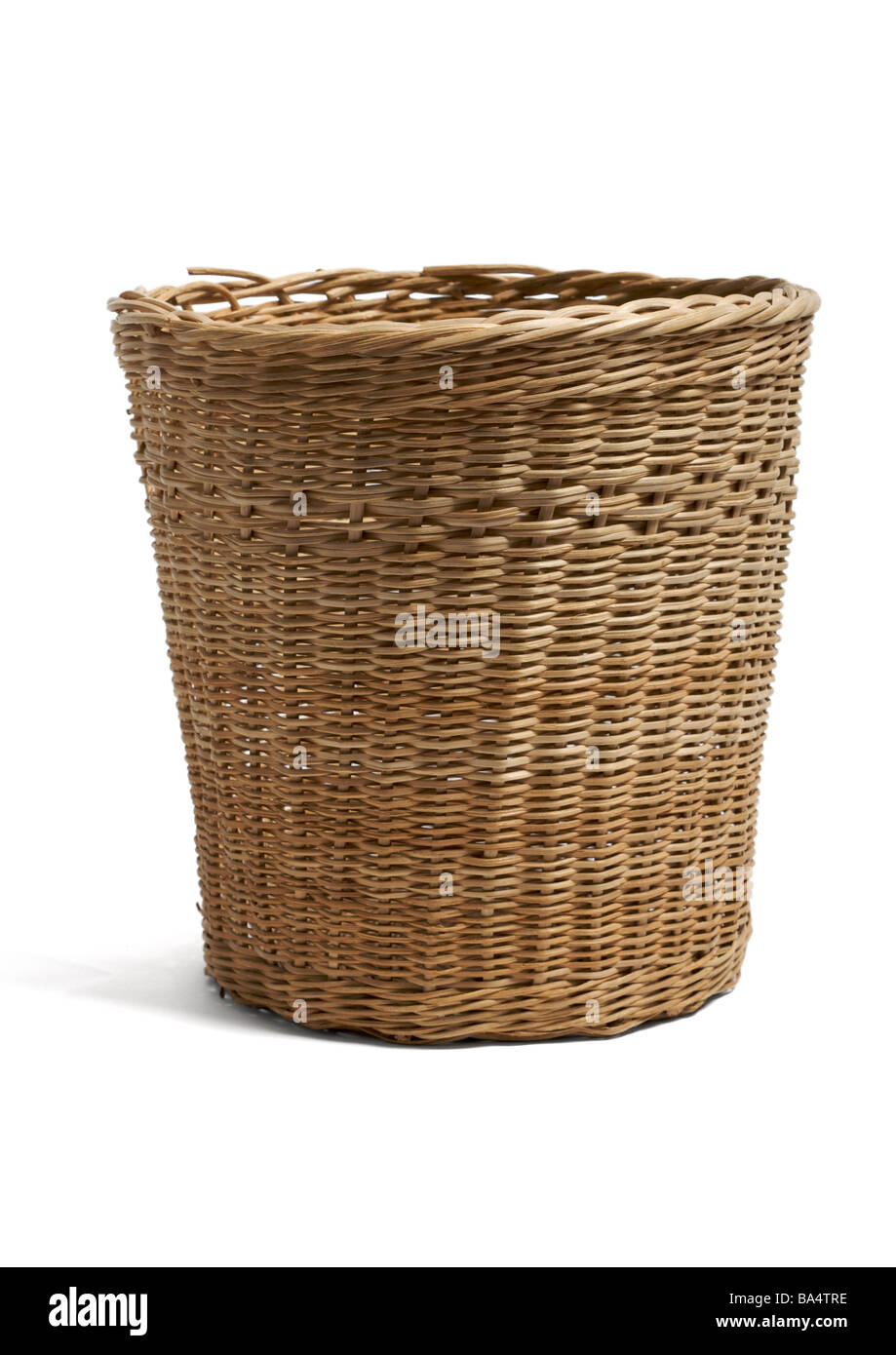 Wicker waste paper bin on white background Stock Photo Alamy