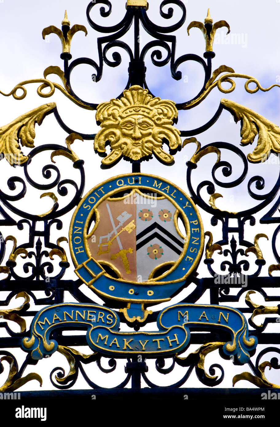 Oxford, England, UK. New College. Detail above gate in Garden Quadrangle. "Honi soit qui mal y pense" and "Manners makyth man" Stock Photo