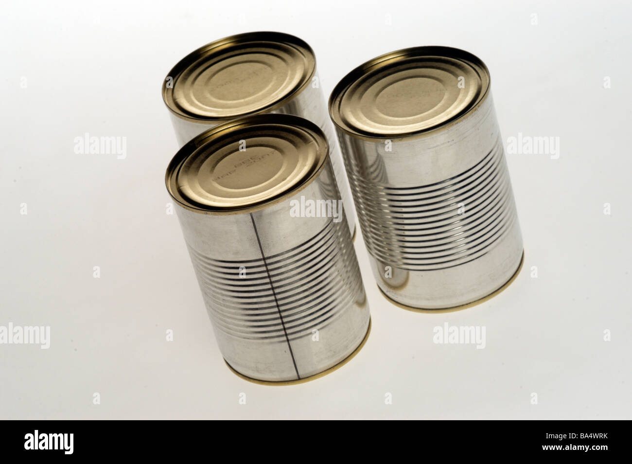 three plain tin cans Stock Photo - Alamy