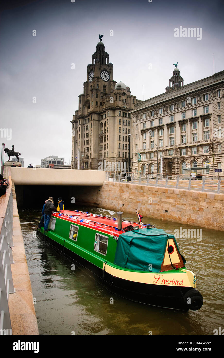 The narrowboat  named Liverbird on the new canal link on the Leeds Liverpool in front of the Liver building Stock Photo