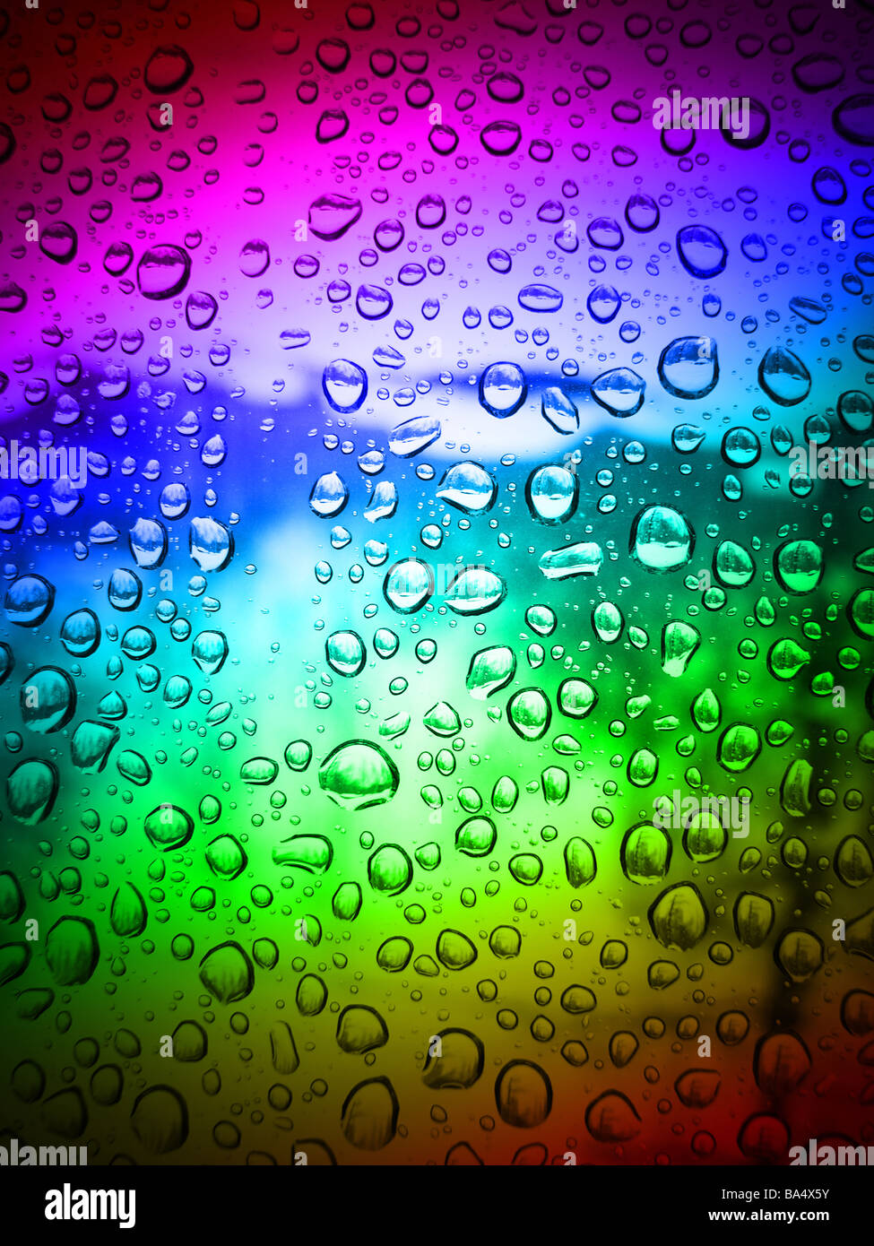 Rain drops on glass color Stock Photo - Alamy