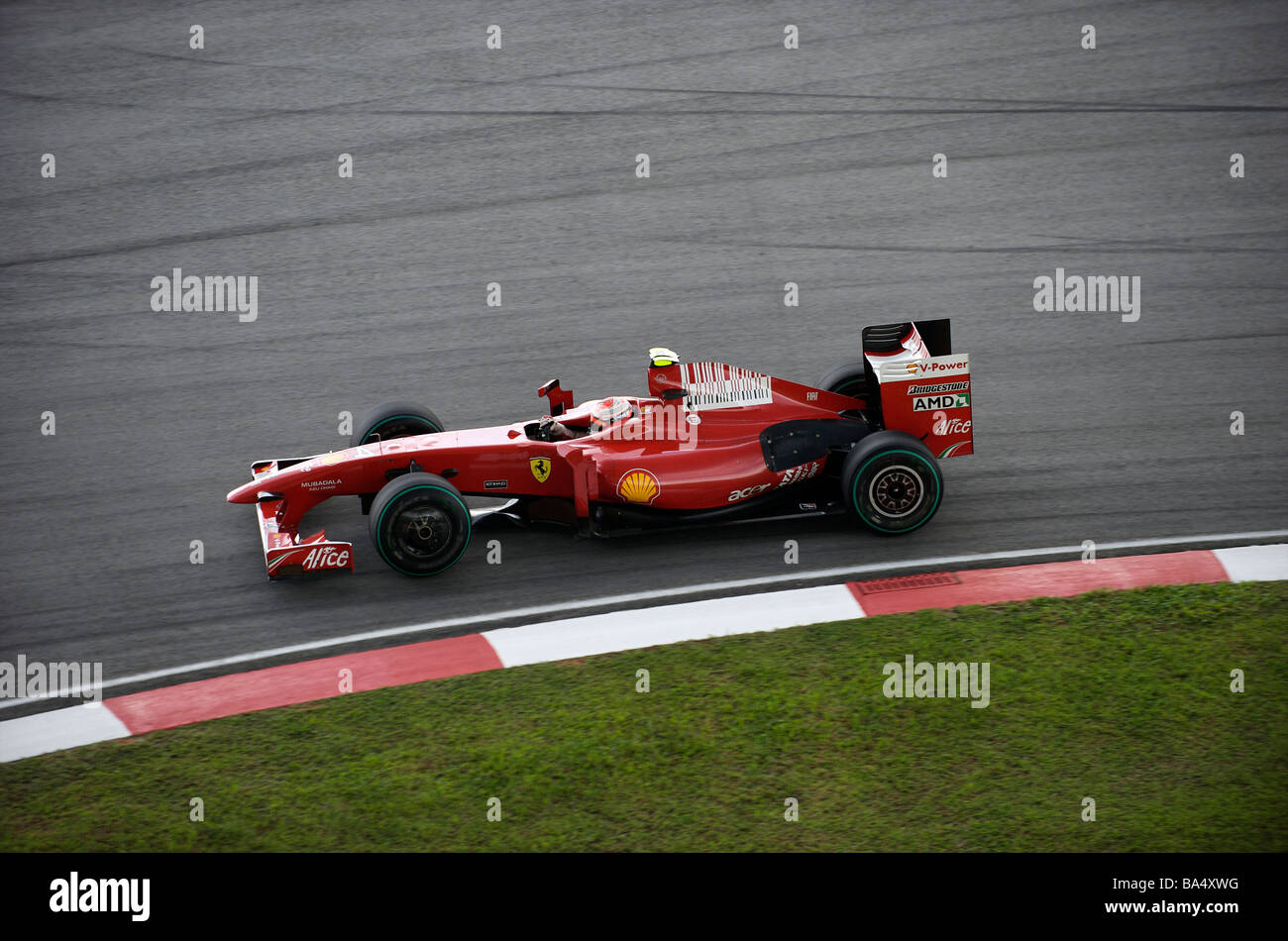 Scuderia Ferrari Marlboro driver Kimi Raikkonen of Finland steers his car during the 2009 Fia Formula One Malasyan Grand Prix Stock Photo