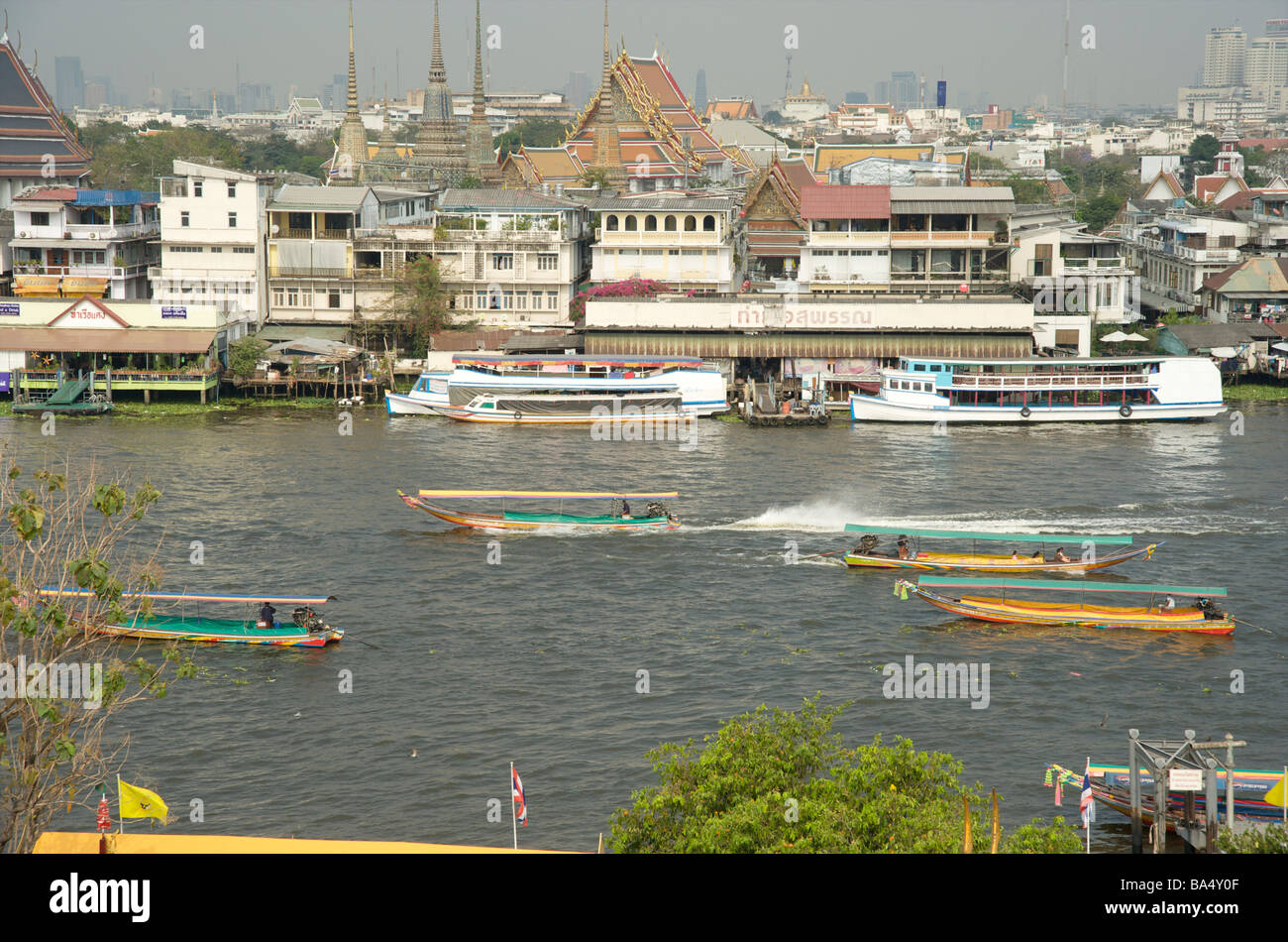 Long tail taxi boats on the Chao Phraya river in Bangkok Thailand with ...