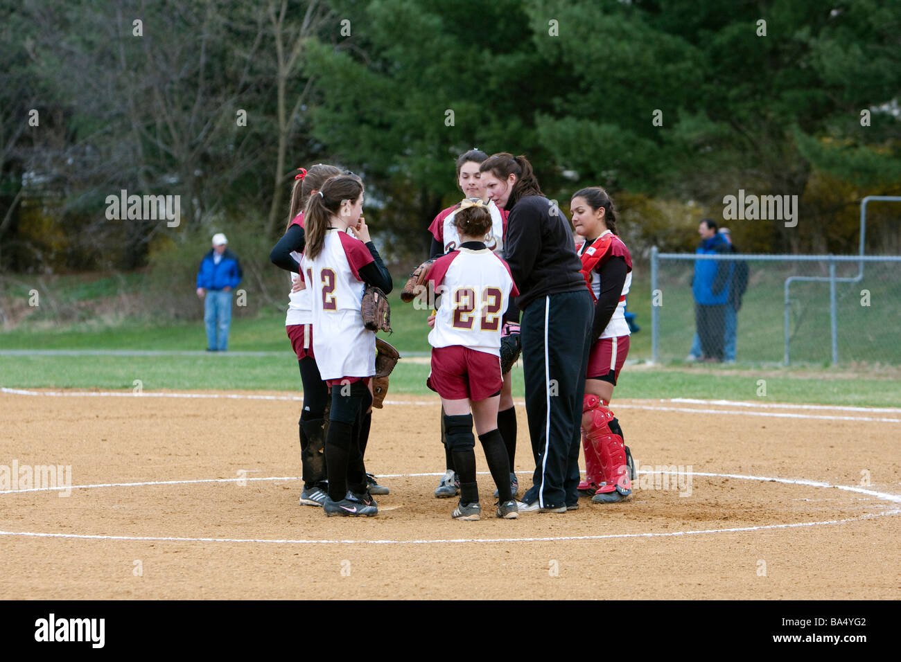 A girls high school softball game Stock Photo Alamy