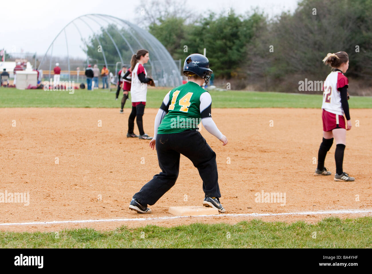 A girls high school softball game Stock Photo Alamy