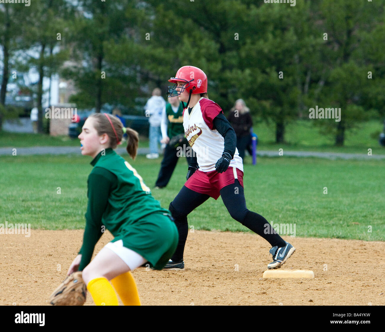 A girls high school softball game Stock Photo Alamy