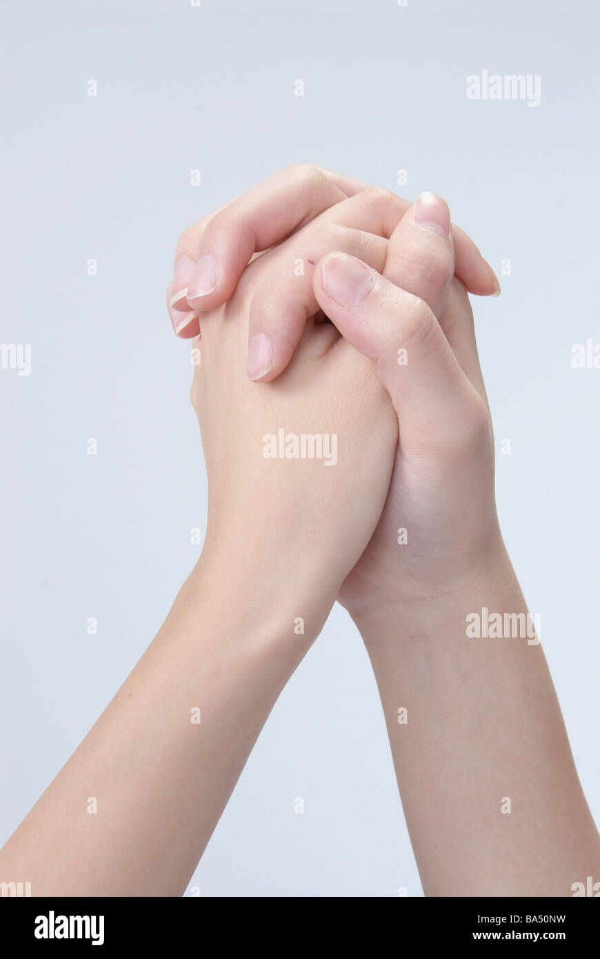 pics Holding Hands Reference Upwards https www alamy com stock photo two hands interlocked together in studio 23467301 html