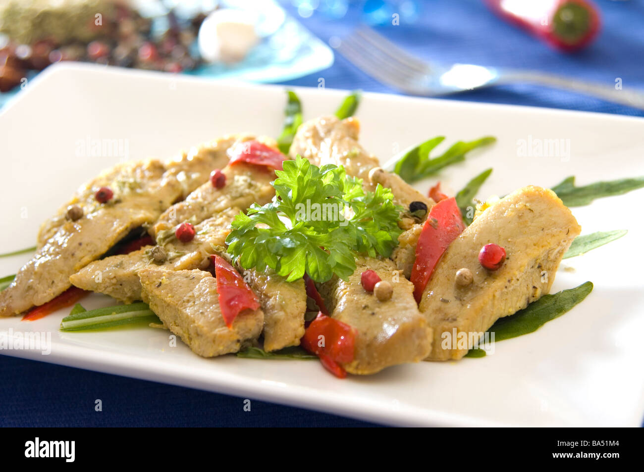 Veal escalopes cooked in vegetables and spices Stock Photo Alamy