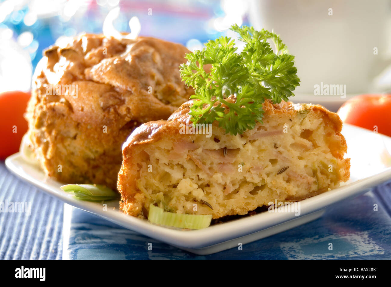 Yeast cake muffins with leek and ham Stock Photo Alamy